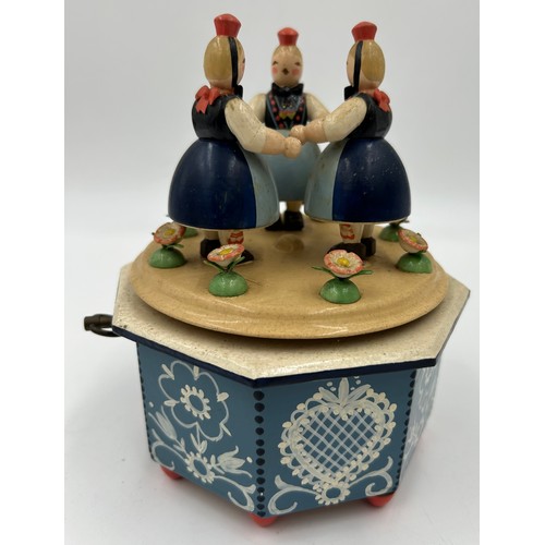 465 - A quantity of Erzgebirge hand painted German wooden music boxes, Wendt & Kuhn to include Apple, Gard... 