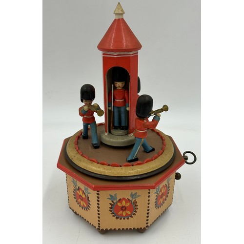 466 - A collection of Erzgebirge hand painted German wooden Christmas themed music boxes to include Christ... 