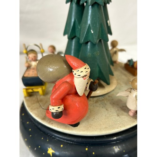 466 - A collection of Erzgebirge hand painted German wooden Christmas themed music boxes to include Christ... 