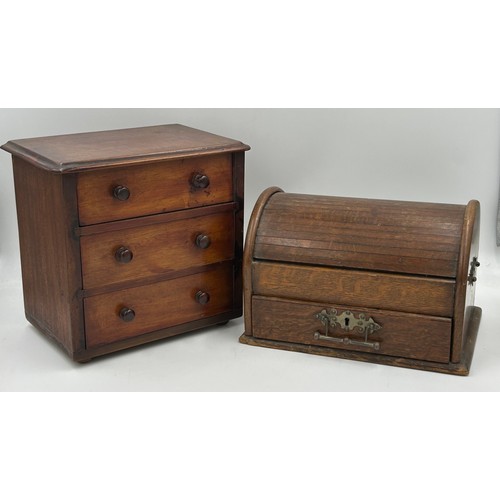 1064 - A mahogany apprentice 3 drawer chest measuring 24cm h along with a oak box with dome tambour with en... 