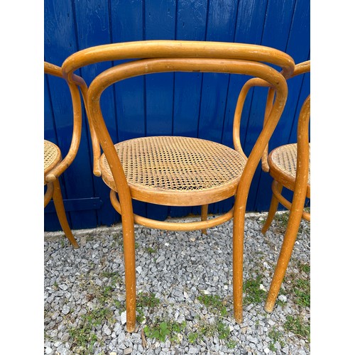 29 - A set of four vintage 1960's bentwood dining chairs by Thonet for Ligna, Czechoslovakia with rattan ... 