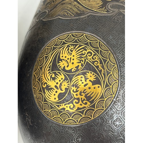 1019 - Pair of Japanese Damascened iron vases from Komai of Kyoto, both signed in gold to base areas. 31cm ... 