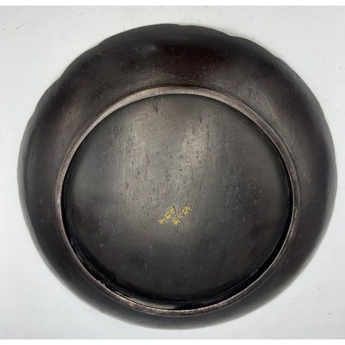 1021 - Japanese Komai inlaid iron dish, late 19thC/early 20thC. 24cm d.