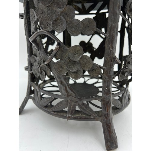 1026 - Japanese bronze lantern with cherry blossom decoration. Approximately 25cm h.