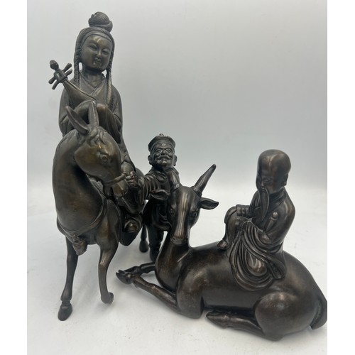 1041 - Three Japanese bronze figures. Tallest 19cm h.