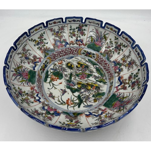 1049 - Chinese famille rose porcelain bowl with crenelated rim finely painted with mandarin ducks, flowers ... 