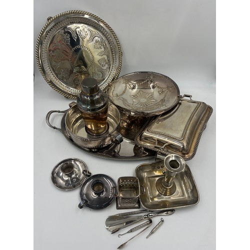 851 - A large quantity of good quality silver plated items to include entrée dish, large tray, cocktail sh... 