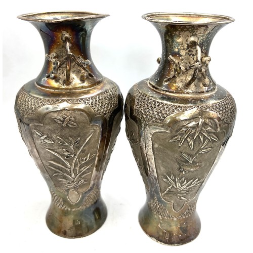 859 - A pair of unmarked white metal Japanese vases 16cm h and an oriental circular dish.