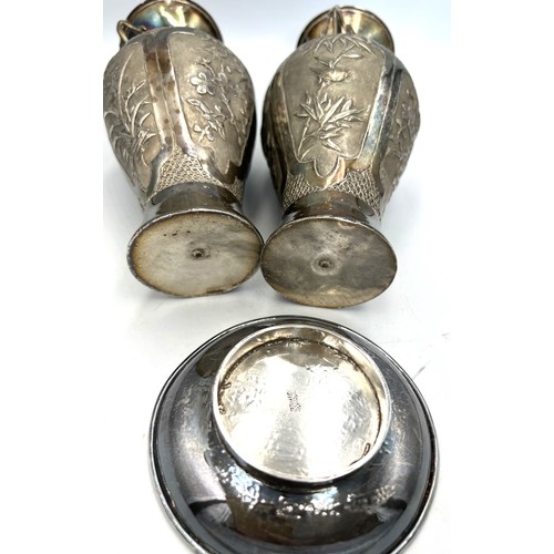 859 - A pair of unmarked white metal Japanese vases 16cm h and an oriental circular dish.