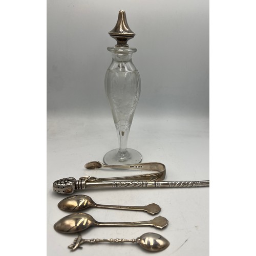 860 - Miscellaneous silver to include American sterling silver topped scent bottle, hallmarked silver suga... 