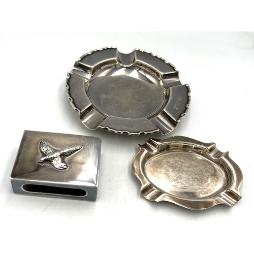 867 - Silver to include two ashtrays and a .925 match box cover with pheasant to top. Larger ashtray North... 