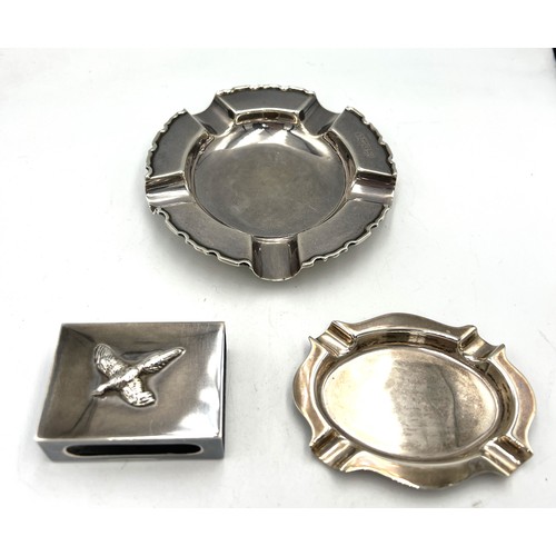 867 - Silver to include two ashtrays and a .925 match box cover with pheasant to top. Larger ashtray North... 