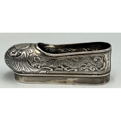 870 - Hong Kong white metal miniature shoe decorated with dragons. Probably by Po Cheng. 9cm l. Weight 40g... 