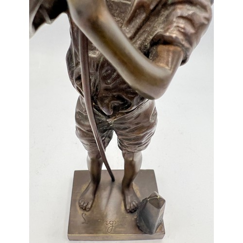 1418 - A 20thC French bronze boy hunter figure after Auguste Moreau with signature to base. 53cm h.