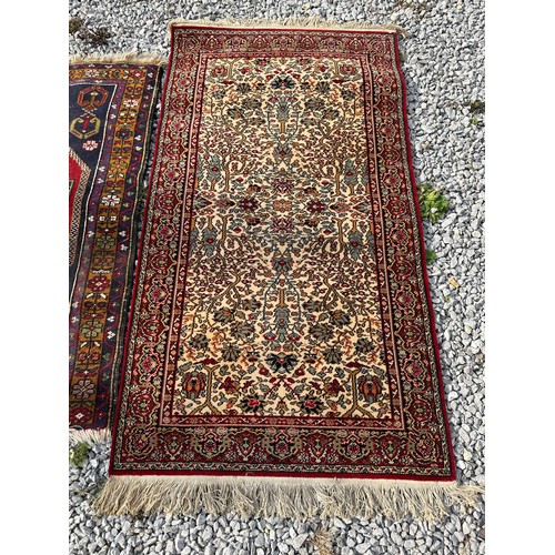 1288 - A Kandahar pure virgin wool pile rug made in Belgium with red, cream and sage green design, 161 x 89... 