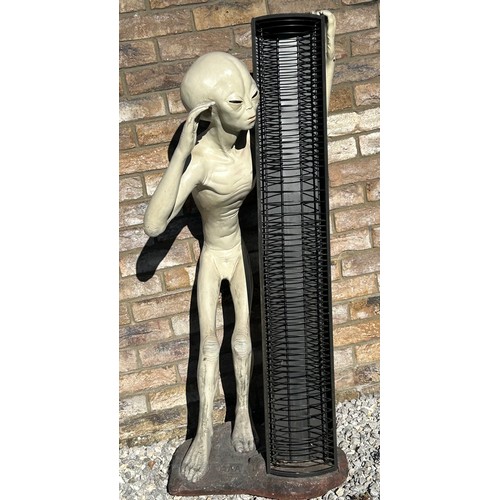 1414 - A life size model of an Alien made from resin with a CD holder standing on a heavy base with makers ... 