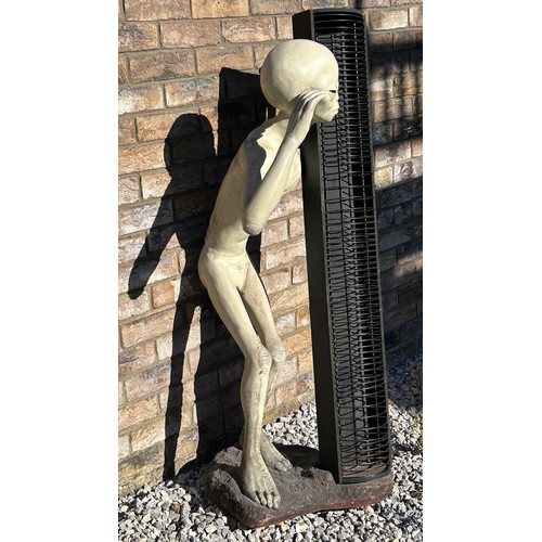 1414 - A life size model of an Alien made from resin with a CD holder standing on a heavy base with makers ... 