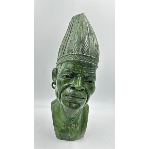 1004 - A 'Masai Man' carved in South African Verdite by Naboth Kudzunga 43cm h. With a certificate of authe... 