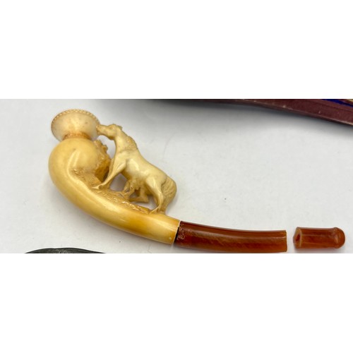 1377 - A 19thC meerschaum cheroot holder with amber mouthpiece a/f, in fitted case together with a 19thC pe... 