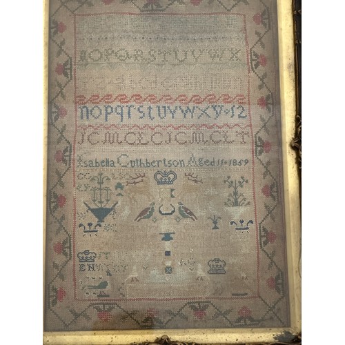 961 - A 19thC sampler by Isabella Cuthbertson Aged 11 1859, in a decorative contemporary frame, 41 x 28cm,... 