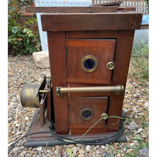 1378 - A 19thC mahogany and brass magic lantern. 52 h x 24 w x 43cm d.