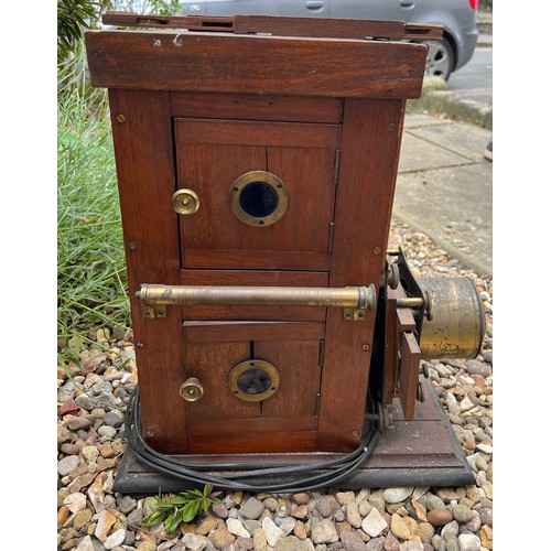 1378 - A 19thC mahogany and brass magic lantern. 52 h x 24 w x 43cm d.