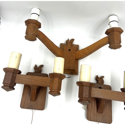 161 - Squirrelman: Three Wilfred Hutchinson of Husthwaite double light English oak wall brackets. Two 24cm... 