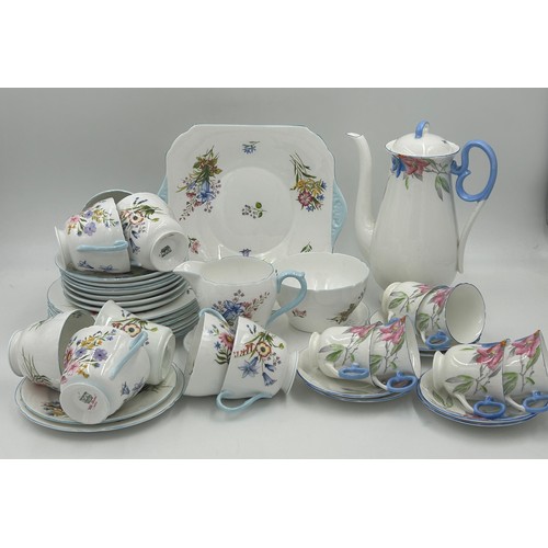 382 - A Shelley part coffee set floral pattern V.2194 comprising of coffee pot and six cups and saucers al... 