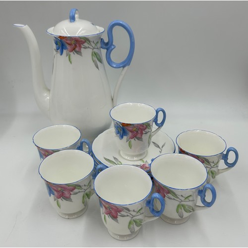 382 - A Shelley part coffee set floral pattern V.2194 comprising of coffee pot and six cups and saucers al... 