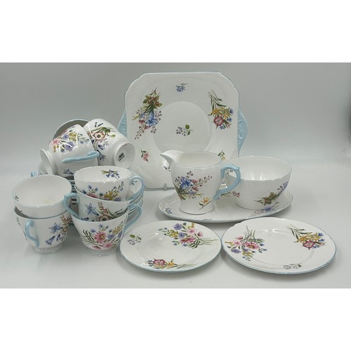 382 - A Shelley part coffee set floral pattern V.2194 comprising of coffee pot and six cups and saucers al... 