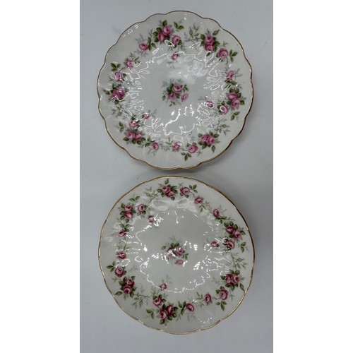 385 - An Aynsley Grotto Rose and Marine Rose part tea service to include 7 x sandwich plates measuring 21c... 