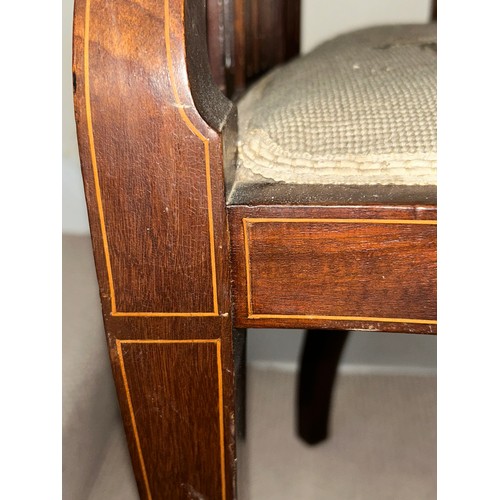 62 - An Edwardian mahogany inlaid armchair with wool work seat. 94.5cm h, to seat 44cm, width 57cm.