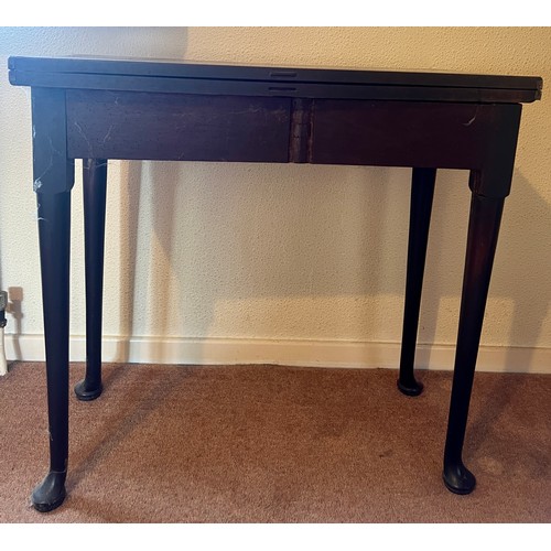 53 - An 18thC mahogany fold over tea table with single gate and pad feet. 76cm w x 36cm d x 72cm h.