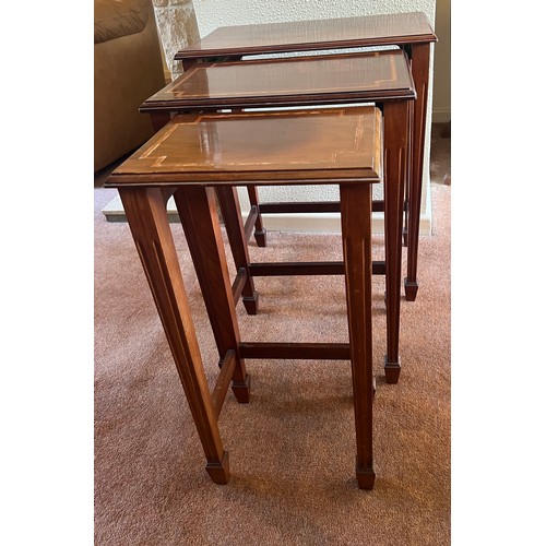 57 - Nest of three Edwardian mahogany inlaid tables. 63cm h x 51cm w x 31cm d.