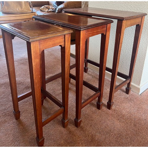 57 - Nest of three Edwardian mahogany inlaid tables. 63cm h x 51cm w x 31cm d.