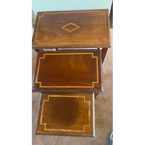 57 - Nest of three Edwardian mahogany inlaid tables. 63cm h x 51cm w x 31cm d.