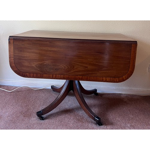 58 - A 19thC mahogany pembroke table with dummy drawer on original brass casters. 91cm w x 56cm d x 68cm ... 