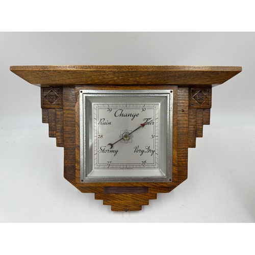 1124 - A mahogany mantel clock, inlaid with satinwood and mother of pearl with enamelled face 32cm x 21.5cm... 