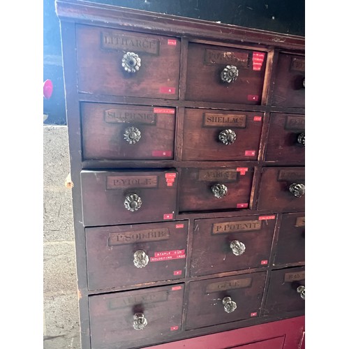 64 - Nineteenth century drug run/drawers, multiple drawers over cupboards to base. 268cm l x 137cm h x 30... 