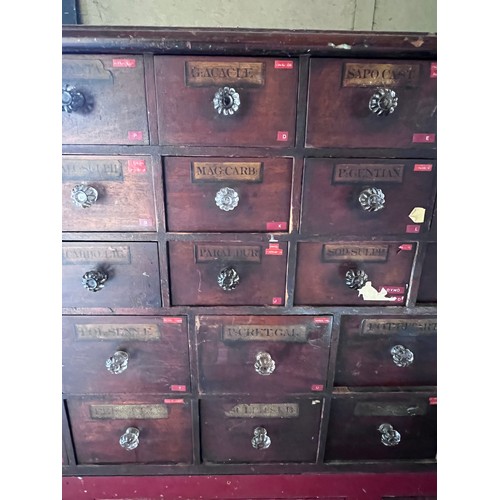 64 - Nineteenth century drug run/drawers, multiple drawers over cupboards to base. 268cm l x 137cm h x 30... 