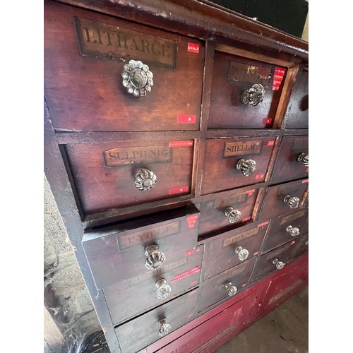 64 - Nineteenth century drug run/drawers, multiple drawers over cupboards to base. 268cm l x 137cm h x 30... 