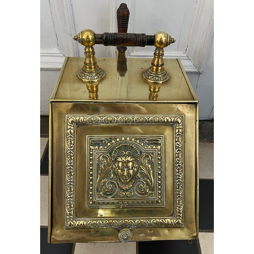 1072 - A 19thC decorative brass coal box with shovel  to rear. 42cm d x 28cm w.