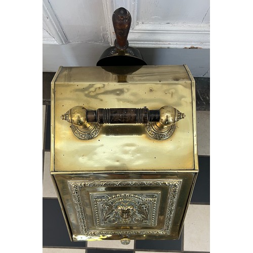 1072 - A 19thC decorative brass coal box with shovel  to rear. 42cm d x 28cm w.