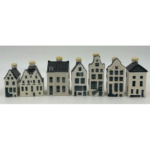 379 - A collection of Blue Delft cottages made exclusively by KLM by Bols Amsterdam, bols genever 35ml, al... 