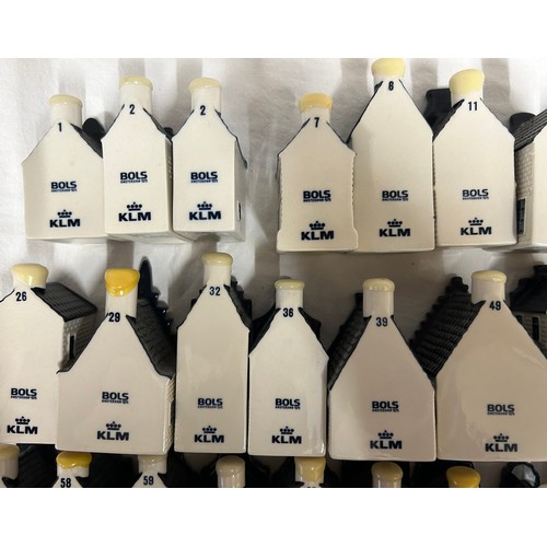 379 - A collection of Blue Delft cottages made exclusively by KLM by Bols Amsterdam, bols genever 35ml, al... 