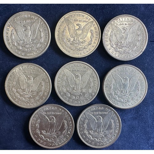 796 - A collection of eight United States of America Silver Dollars to include 1879, 1880, 1883, 1884 x 2,... 