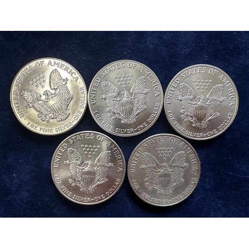 799 - A collection of five United States of America Silver Dollars to include 1986, 1987, 1989, 1991, 1992... 