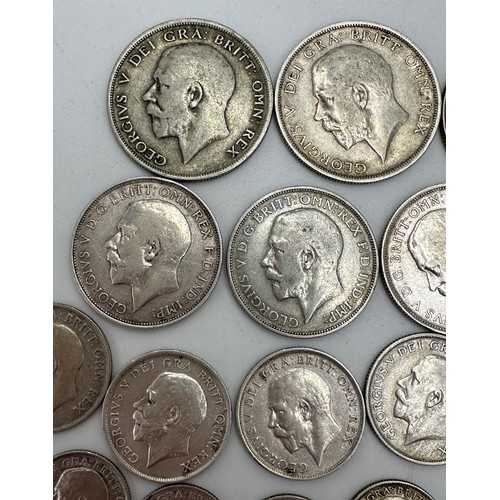 810 - A collection of mixed silver coinage to include George V : 6 x half crowns, 7 x florins, 10 x shilli... 