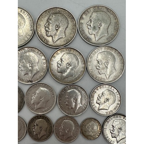 810 - A collection of mixed silver coinage to include George V : 6 x half crowns, 7 x florins, 10 x shilli... 