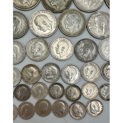 810 - A collection of mixed silver coinage to include George V : 6 x half crowns, 7 x florins, 10 x shilli... 